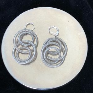 Fun statement earrings in lightweight metal.